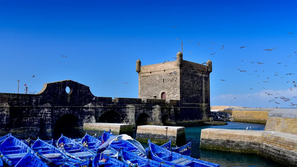 Essaouira medina and blue fishing boats Atlantic coast